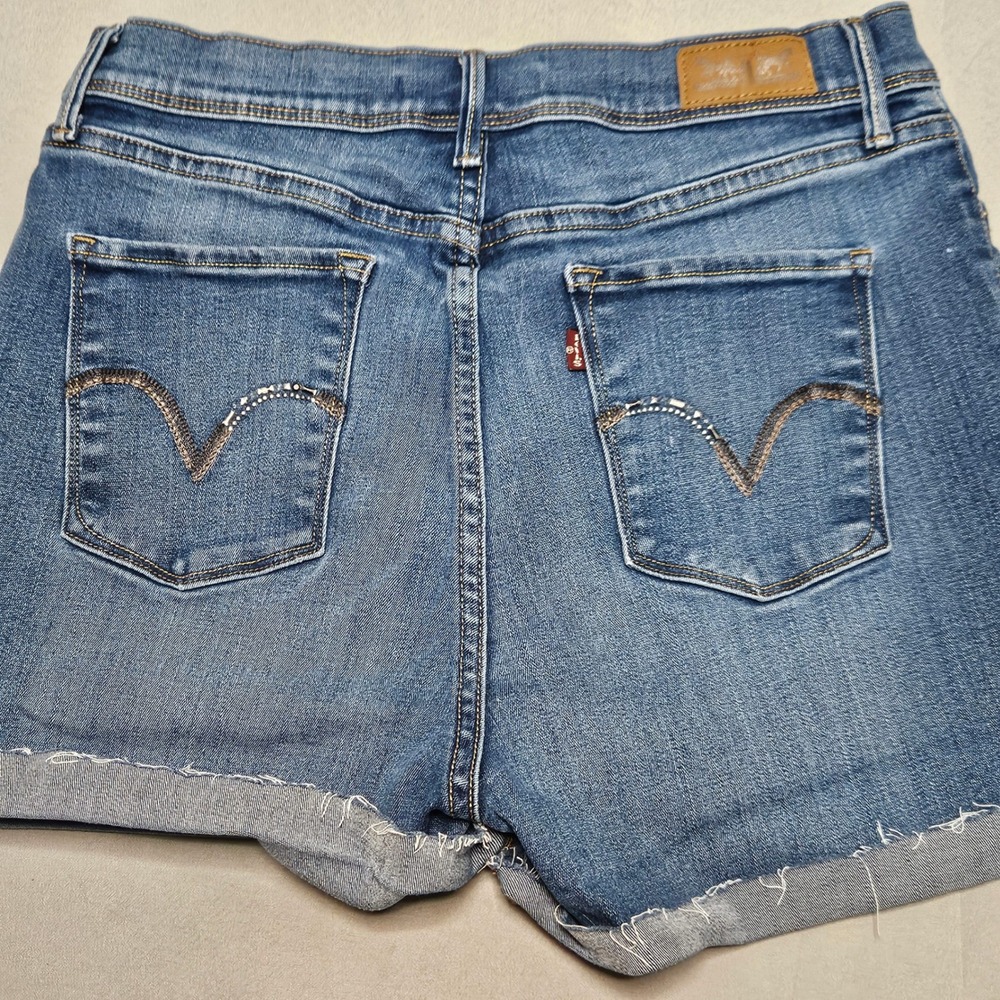 Levi's Mid Rise Denim Shorts Womens 12L W31 Blue Raw Hem Frayed Stretch 3947